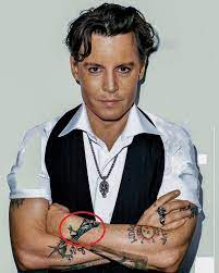 Sailor (right arm forearm) this tattoo is a portrait of johnny depp's grandfather, who was a sailor. Johnny Depp S 37 Tattoos Their Meanings Body Art Guru