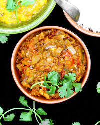 Baingan Bharta Indian Fire Roasted Eggplant In A Tomato Onion Sauce Recipe Bharta Recipe Fire Roasted Vegan Indian Recipes