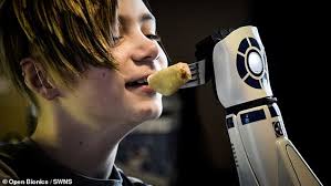 Boy who lost legs and hands to meningitis gets £10,000 Star Wars bionic arm 