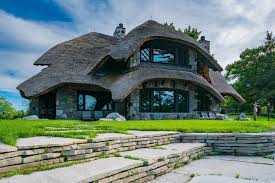 A mushroom patch is born. Mushroom Houses Of Charlevoix All Hobbits Welcome To Michigan The Planet D