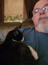 Cute kitty! I'm sorry for the loss of your mom. Sounds like she sent you  someone to keep you company!