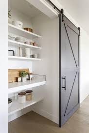 Barn door cabinet or pantry. 30 Farmhouse Kitchen Ideas For A Warm And Cozy Cooking Space Kitchen Pantry Doors Kitchen Barn Doors Barn Door Pantry