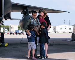 U S Air Force Lt Col Julius Romasanta 44th Fighter Squadron F 15 Eagle Pilot Embraces His Family On The Flightline At Kadena Fighter Pilot Air Force Pilot