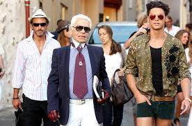 Six mois après la mort du kaiser, le mannequin français évoque dans « têtu » sa relation particulière avec le styliste, dont il entend préserver la mémoire. Avec Son Protege Baptiste Giabiconi