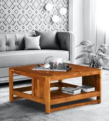 Rustic natural aged brown medium square wood coffee table with drawers. Buy Avian Solid Wood Coffee Table In Rustic Teak Finish Woodsworth By Pepperfry Online Square Coffee Tables Tables Furniture Pepperfry Product