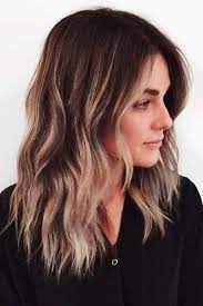 While the color of the hair reminds of on the '80s and grunge, the medium length shag haircut makes everything look romantic and pretty. Pin On Hair