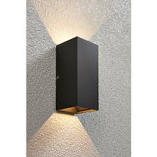A steel framework finished in matte black is accented with panels of clear, water glass. Saxby Volta Adjustable Matt Black Clear Glass Twin Wall Light Wickes Co Uk