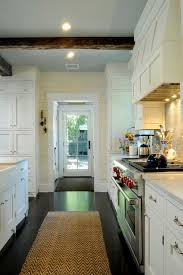 However, the one concern you might have about putting such a light wood in a kitchen environment would be potential damage from dirt and food spills that could stain. White Kitchen Cabinets And Dark Wood Floors Cheap Wood Flooring White Kitchen Cabinets Cheap Flooring