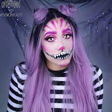 Complete the look with a white bodysuit and tights — and glitter, of course! Halloween Inspo Cheshire Cat Myvisionbeauty Makeup Cat Halloween Makeup Halloween Makeup Looks Cool Halloween Makeup