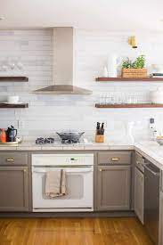 Incorporate hints of rusticity here and there — like a distressed tile or weathered wood beams — to create a kitchen that's all your own. 75 Beautiful Rustic Kitchen With Tile Countertops Pictures Ideas July 2021 Houzz