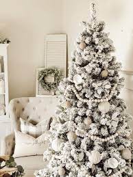 A Farmhouse Cottage Christmas Home Tour A Beautiful Flocked King Of Christmas T Flocked Christmas Trees Decorated Cottage Christmas Farmhouse Christmas Decor