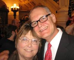 16 years ago, my story was told in Michael Moore's documentary "Sicko." I  still struggle for the health care I need