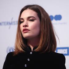 Her grandmother, helen horton, was an american actress. Who Is Lily James As Actress Romantically Linked To Dominic West