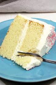 In a small saucepan, bring heavy cream to a boil. This Vanilla Cake With Whipped Cream Cheese Frosting Is Perfectly Moist Easy And Ai Whipped Cream Cakes Whipped Cream Cheese Frosting Best Vanilla Cake Recipe