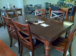 Made of veneers, wood and engineered wood. This Warm Rustic Beauty Of The Porter Dining Room Collection By Ashley Furniture Uses A Deep Brown Finish And Easily Fits Comfortab Ejercicios De Entrenamiento