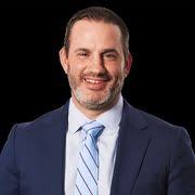 Brian Curci — Senior Vice President and General Counsel at NRG Energy