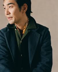 Our signature Mk. I Games suit draws inspiration from workwear as much as  tailoring; a casual 3-roll-2 button jacket with a boxy silhouette, relaxed  trousers and an unstructured body shape. Twin needle