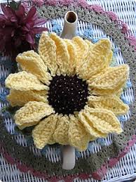 The knitting of tea cosies is a very traditional idea and if you go to england check out the church bazaars, etc. Ravelry Sunflower Tea Cosy Pattern By Gail Clements