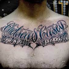 Children S Names Chest Tattoo In Black White Shading Script By Celebrity Ink In 2021 Tattoos Best Tattoo Shops Tattoo Lettering