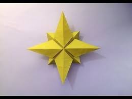 North Star Origami Tutorial How To Make An Origami North Star Youtube Origami Christmas Star Christmas Origami Origami Stars