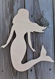 The mermaid is a complicated, graceful, strong, and delicate creature, inspiring our imaginations, and our sense of adventure and romance. 12 14 Or 16 Mermaid Silhouette Wooden Mermaid Cutout Mermaid Wall Decor Mermaid Craft Unpainted Or Painted Mermaid Wood Blank Buy Online In Bahamas At Bahamas Desertcart Com Productid 79719300