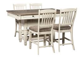 This set includes a rectangular,. Signature Design By Ashley Bolanburg 5 Piece Table And Chair Set With Wine Storage Wayside Furniture Pub Table And Stool Sets