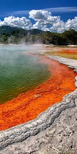 Auckland New Zealand Champagne Pool Is A Hot Spring Within The Waiotapu Area Near Aucklan Travel Destinations Amazing Travel Destinations Scenic Train Rides