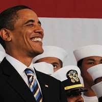 President Barack Obama, center, speaks to approximately 5,000 U.S. Service  members who gathered to see him speak inside a hangar at East Fort Bliss,  Texas, Aug. 31, 2012 120831-A-UT290-079