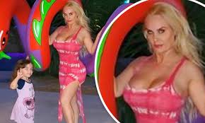 Her serbian ancestry comes from her maternal grandparents. Coco Austin 41 Looks Curvy As She Poses With A Large Dragon Blowup Toy Daily Mail Online