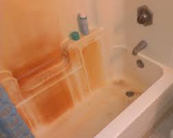 remove rust stains from tubs, toilets