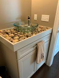 Vessel sink faucets are very popular bathroom improvement hardware because they not only improve their appearance; Diy River Rock Bathroom Counter And Vessel Sink Hometalk