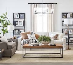 Your coffee table is often the focal point of your living room, and it is not uncommon for this surface to become the landing pad for all sorts of small items that find their way into the space. Living Room Ideas Furniture Decor Pottery Barn