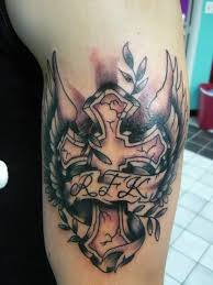 Baseb, inside cross tattoo i might want my angel tat to be the angel. 150 Meaningful Cross Tattoos For Men Women January 2021