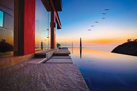15 Soothing Infinity Pool Designs For Instant Relaxation Home Design Lover Infinity Pool Pool Designs Luxury Pools