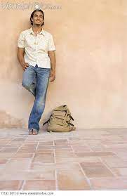 Keep your feet 6 inches apart. Man Leaning Against Wall Senior Pictures Poses Picture Poses Model Poses