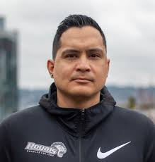 Volleyball coach Jeff Ross focuses