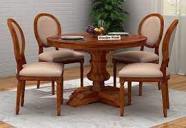 This set comes with a round dining table and four dining chairs. Clark 4 Seater Round Dining Set Honey Finish Round Dining Table Sets Dining Table 4 Seater Dining Table