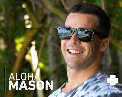 Mason and Coco Ho Paddle Out With Spy