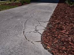 For a residential driveway, i wouldn't recommend less than 5 thick, 3500psi, 5 1/2 sack mix concrete. Concrete Driveway Repair And Renovation Options The Concrete Network