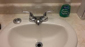 Set the rope of plumber's putty on the underside of the sink drain flange. Fixing A Bathroom Faucet Leaking From Underneath Doityourself Com Community Forums