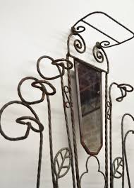 Shop our wrought iron hall tree selection from the world's finest dealers on 1stdibs. Scrolling Wrought Iron Hall Tree Coat Umbrella Mirror Stand Arts And Crafts Style For Sale At 1stdibs