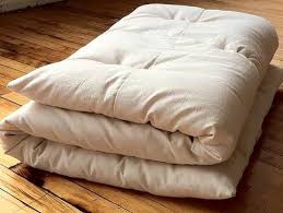 A shikibuton, tatami mat, bed sheet, kakebuton, and futon pillow! How To Make A Futon More Comfortable