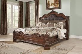 The Ledelle Sleigh Bed From Ashley Furniture Homestore Afhs Com With The Traditional Dark Cherry Stain King Bedroom Sets King Size Bedroom Sets Bedroom Sets