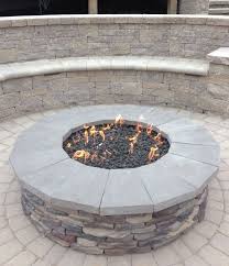 Gas Firepit With Stone Veneer And Natural Stone Caps Seating Wall Behind Gas Fire Pits Outdoor Natural Gas Fire Pit Fire Pit Patio
