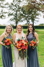Mauve and light purple bouquets is another ideal choice for your light purple fall wedding! Bridesmaids In Blue Grey Dresses Long Blue Gray Bridesmaid Dresses Orange Bridesmaids Bouquets Pink Orange Bridesmaid Dresses Orange And Pink Wedding