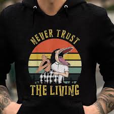 Show off your sense of goth horror style with this creepy cute shirt that's perfect for the occult enthusiast. Pretty Beetlejuice Never Trust The Living Vintage Shirt Hoodie Sweater Longsleeve T Shirt