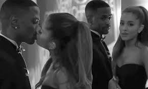 Ariana Grande shares tender kiss with Big Sean