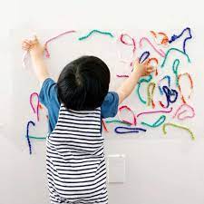 Look for toddler wool socks that are slightly snug, but not too tight. Sticky Wall Yarn Sensory Activity For Babies And Toddlers Hello Wonderful