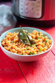 For the printable full recipe and ingredient list: It Is So Easy To Make This Instant Pot Mexican Red Rice