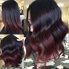 Deeper red hues blended with black hair are the perfect way to introduce dimension to your hair, while simultaneously bending the rules. 18 Chic Ways To Rock Dark Brown Hair With Highlights Short Pixie Cuts